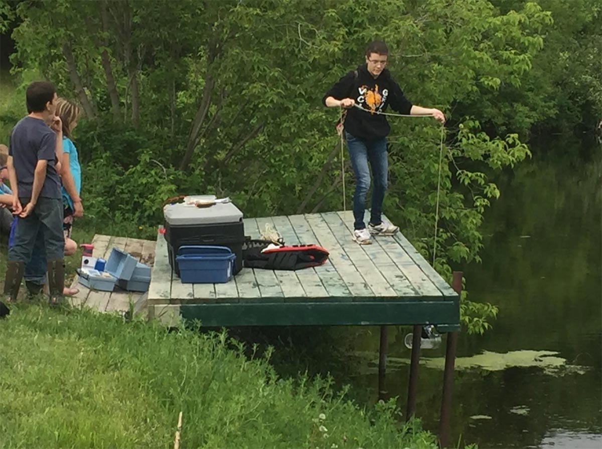 Students learning about water sampling